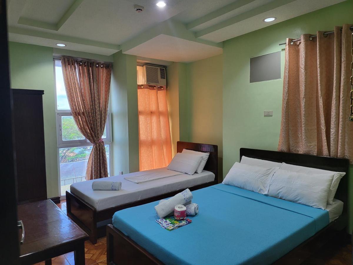 Rooms R Us - Voyagers Palace Puerto Princesa Exterior photo